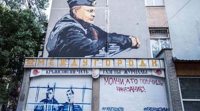 ​В Симферополе появилось граффити с изображением Олега Сенцова и Александра Кольченко